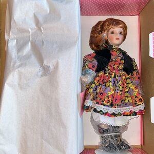 Paradise Galleries handcrafted authentic porcelain doll